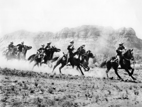 Charging U.S. cavalry, on-set of the western film, "Indian Uprising", Columbia Pictures, 1952