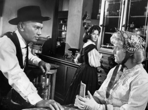 Yul Brynner (left), Janice Rule (center), Gertrude Flynn (right), on-set of the western film,