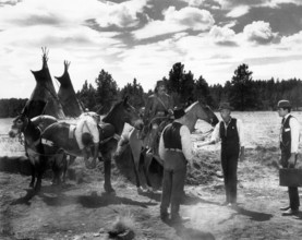 Henry Fonda (on horse), Richard Widmark (2nd right), on-set of the western film, "How The West Was