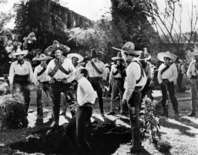 Rodolfo Hoyos, Jr (3rd left), on-set of the western film, "Villa!!", 20th Century-Fox, 1958