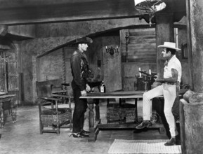 Jock Mahoney, Gilbert Roland, on-set of the western film, "The Last Of The Fast Guns", Universal