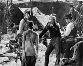 Charlton Heston, Richard Harris, on-set of the western film, "Major Dundee", Columbia Pictures,