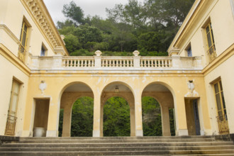 Arched walkway connecting two buildings, Nice, France