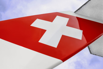 Swiss Airlines logo on airplane tail fin