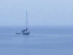 Two boats moored at sea