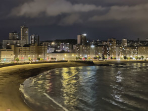 Waterfront buildings at night, A Coruña, Galicia, Spain