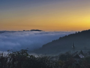 Clouds covering scenic landscape at sunrise, Burgundy, France