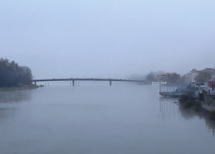 Misty river scene, near Macon, France