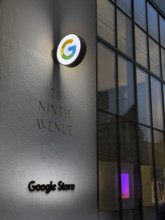 Google store at night, illuminated company logo on building exterior, New York City, New York, USA