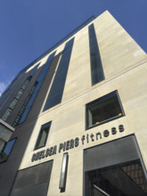 Chelsea Piers Fitness, low angle view of building exterior and company sign, New York City, New