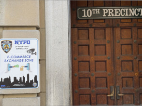 NYPD Station E-Commerce Exchange Zone, sign on building exterior, 10th Precinct, New York City, New