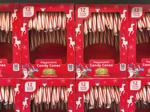 Boxes of peppermint candy canes on display at supermarket