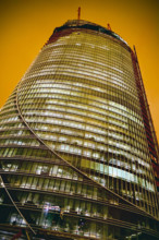 Low angle view of One Congress skyscraper under construction at night, Bulfinch Crossing, Boston,