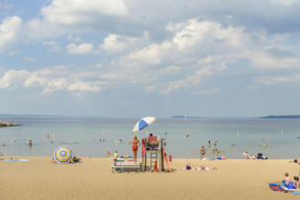 Lifeguard stand and beach scene, Clinch Park Beach, Traverse City, Michigan, USA