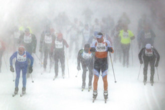 Competitors racing during Nordic skiing segment of North American Vasa Festival of Races, Traverse