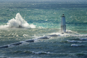 Crashing waves around Frankfort North lighthouse and pier, Lake Michigan, Frankfort, Michigan, USA