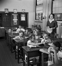 Teacher with students in elementary school class, Washington, D.C., USA, Marjory Collins, U.S.