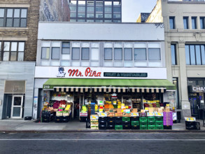 Fruit and vegetable grocery store, building exterior and street scene, Williamsburg, Brooklyn, New