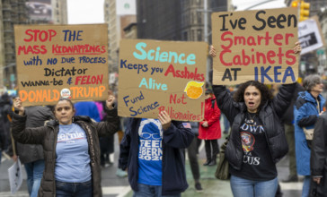 Demonstrators participating in "Hands Off" National Day of Action Protest, New York City, New York,
