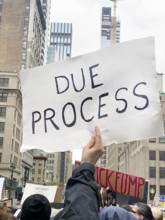 Demonstrators participating in "Hands Off" National Day of Action Protest, Fifth Avenue, New York