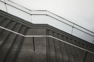 Empty staircase inside commercial building