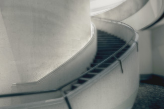 Curved staircase inside commercial building
