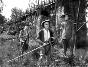Turhan Bey, Walter Huston, Robert Bice, on-set of the film, "Dragon Seed", MGM, 1944