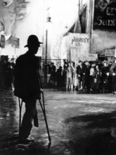 Beggars marching in protest scene, on-set of the German musical film, "The Threepenny Opera",