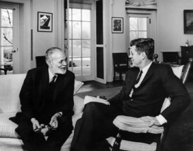 U.S. President John F. Kennedy (in rocking chair) meeting with President of the United Nations (UN)