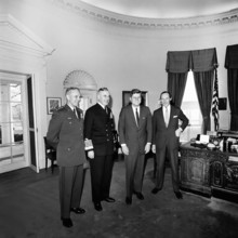 U.S. President John F. Kennedy (2nd right) meeting with Chief of the Defense Staff of British Armed