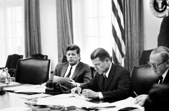 U.S. President John F. Kennedy with U.S. Secretary of Defense Robert S. McNamara (center) and