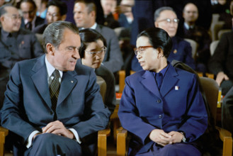 U.S. President Richard M. Nixon sitting with Jiang Qing, wife of Chairman Mao Zedong, during
