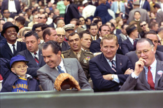 U.S. President Richard M. Nixon, enjoying opening day baseball with Washington Senators owner Bob