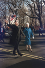 U.S. President George H.W. Bush and U.S. First Lady Barbara Bush walking along Pennsylvania Avenue