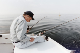 U.S. President George H.W. Bush fishing off the coast of Kennebunkport, Maine, USA, Susan Biddle,