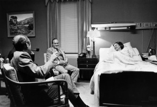 U.S. President Gerald Ford and comedian Bob Hope visiting U.S. First Lady Betty Ford in President's