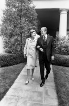 U.S. First Lady Betty Ford escorting U.S. President Gerald Ford to his limousine before heading to