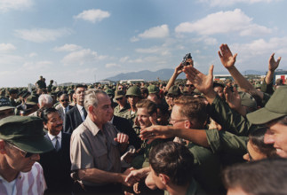 U.S. President Lyndon Johnson shaking hands in a crowd of U.S. troops, Cam Ranh Bay, Vietnam,