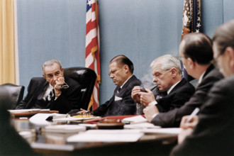 U.S. President Lyndon B. Johnson, Secretary of Defense Robert McNamara, Secretary of the Navy Paul