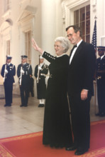 U.S. President George H.W. Bush and U.S. First Lady Barbara Bush await the arrival of President Ali