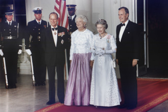 U.S. President George H.W. Bush and U.S. First Lady Barbara Bush hosting State Dinner for Queen