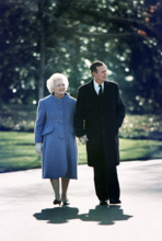 U.S. President George H.W. Bush and U.S. First Lady Barbara Bush taking a last walk around the