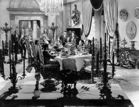 Akim Tamiroff (sitting at the head of the table), on-set of the film, "The Corsican Brothers",
