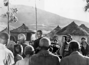 Canada Lee (center, facing camera), on-set of the film, "Cry, The Beloved Country", United Artists,