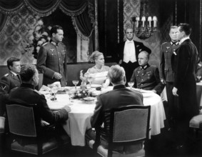 Ingrid Thulin (sitting), , Glenn Ford (standing far right), , on-set of the film, "The Four