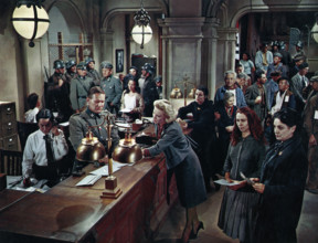Ingrid Thulin (standing at counter), on-set of the film, "The Four Horsemen Of The Apocalypse",