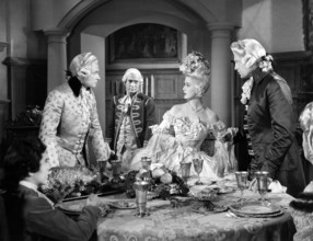George Macready, Anita Louise, John Loder, on-set of the film, "The Fighting Guardsman", Columbia