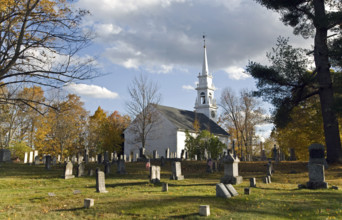 Church and grave yard on Autumn day