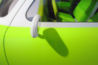 Side mirror detail on bright green 1999 Ford 021C Concept Car