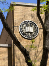 Board of Education, City of New York plaque on building exterior, New York City